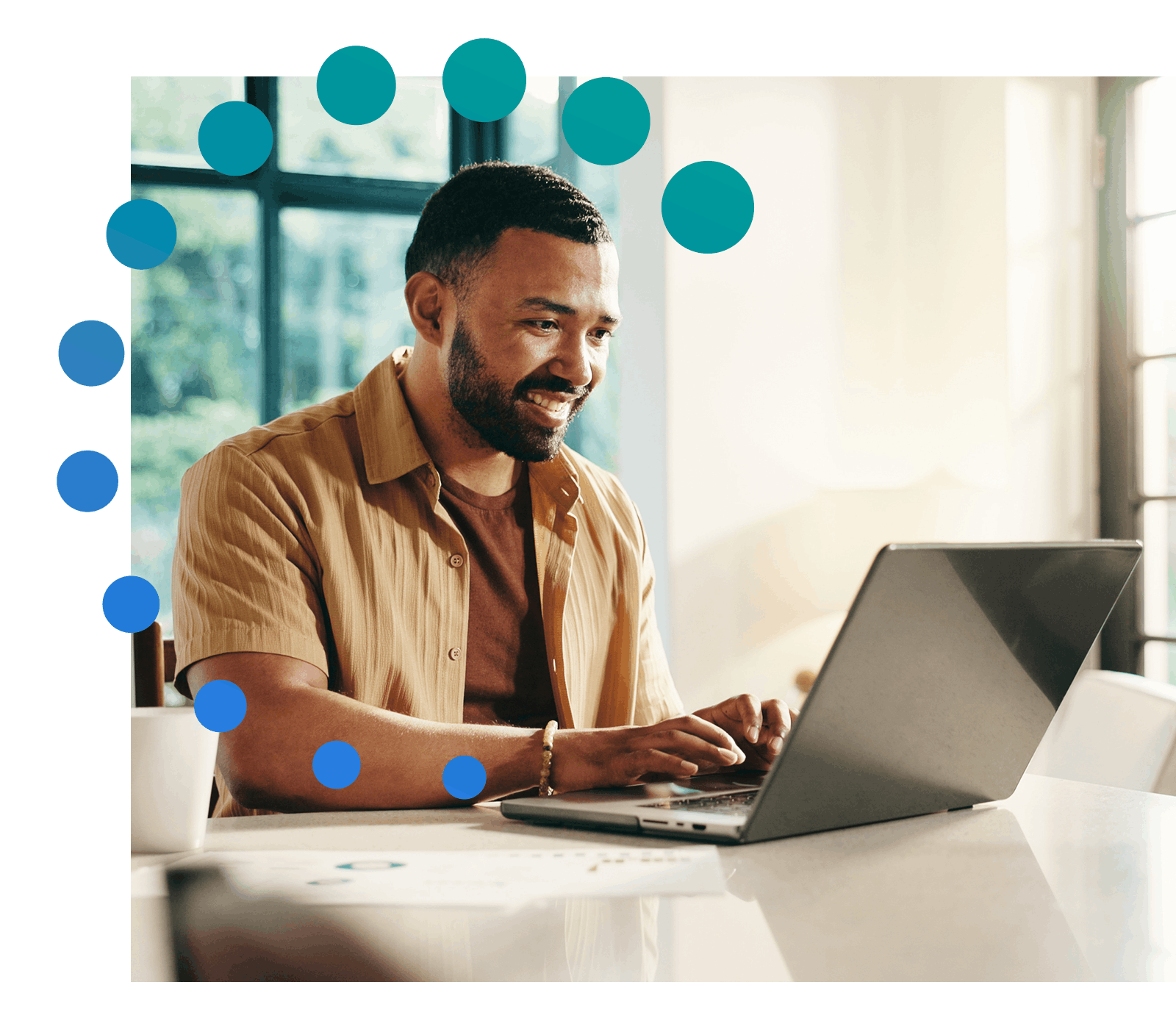 Man at laptop working on savings plan